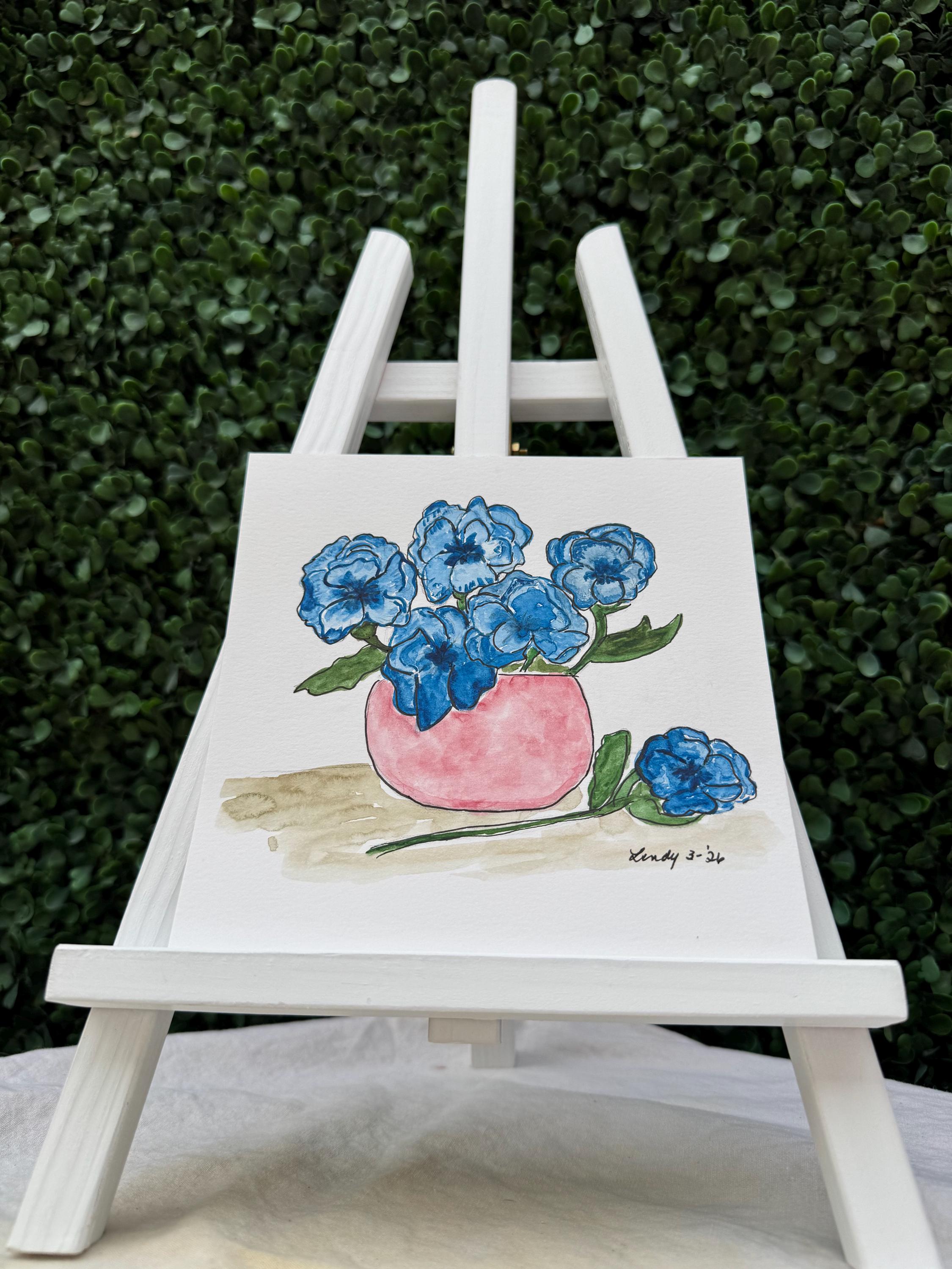 Abstract blue flowers in a pink bowl